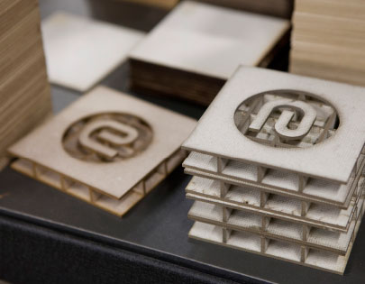 UNIVERSAL CONSTRUCTION PANEL These little coasters bearing the “E” for “ECOR” are actually miniature UCPs.